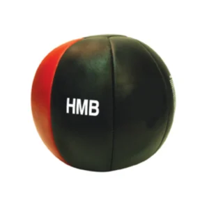 A black and red ball is sitting on the ground.