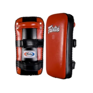 A pair of red and black pads for boxing.