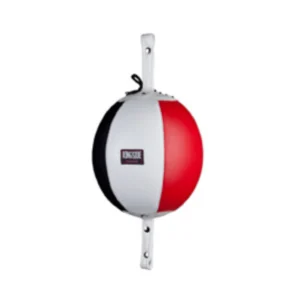 A red, white and black ball hanging from the side of a wall.