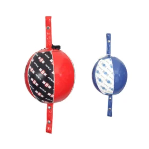 Two balls hanging on a wall with straps.