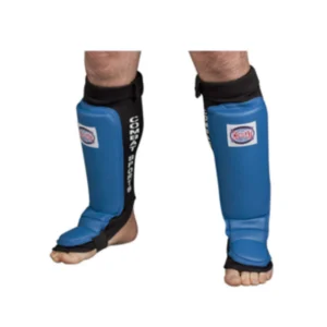 A person wearing blue and black shin guards.