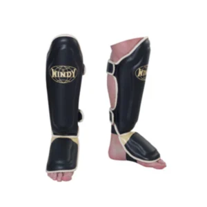 A pair of shin guards that are on the ground.